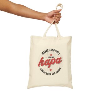 hapa market and grill tote bag held out by hand